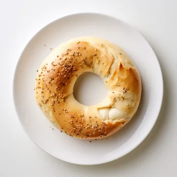 A fresh Bagel Point bagel on a white plate