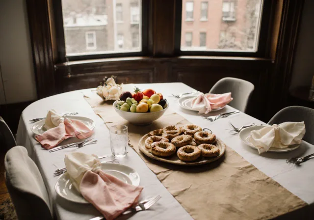 Williamsburg baby shower with Bagel Point party platter, fresh fruit, and pastel decor in a Brooklyn brownstone