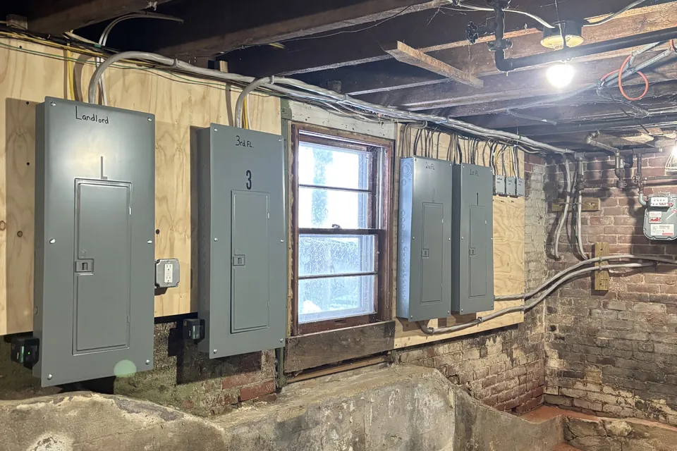 New basement panels installed in a row by Gourley Electric near Worcester