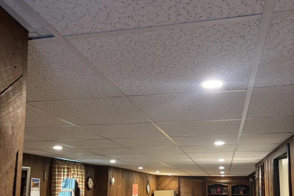 Recessed lighting installed in a finished basement by Gourley Electric