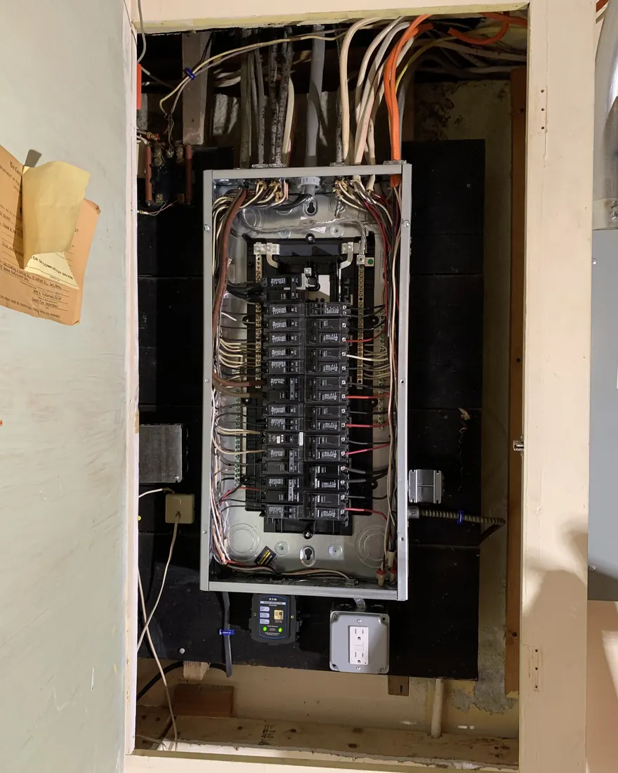 New labeled breaker panel with neatly dressed conductors installed by Gourley Electric in Worcester MA